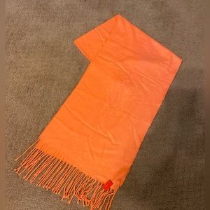 NWOT 100% Cashmere orange long scarf w/long fringes. Size: 70”L x 12W
